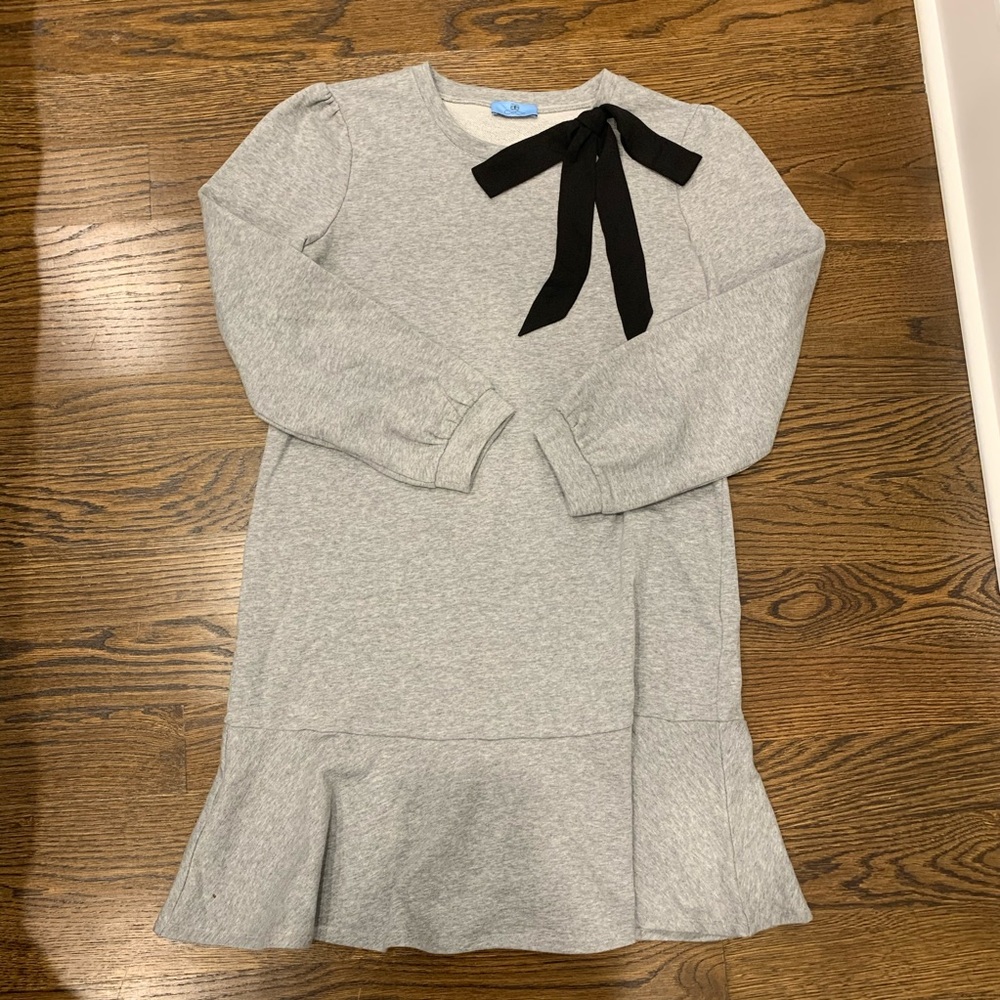 Gray peplum sweater dress with bow detail
